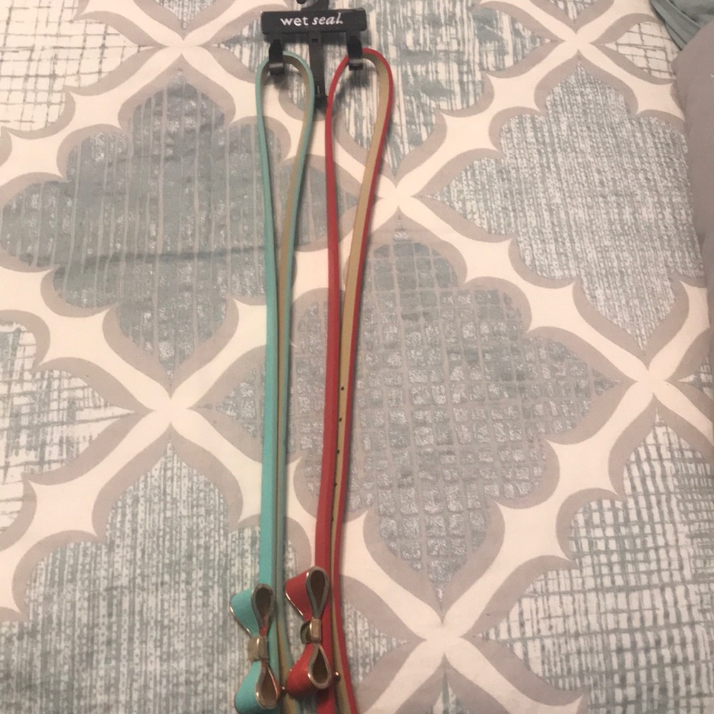 Wet seal thin belts with bows